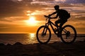 silhouette bicycle on sunset in a beautiful view Lifestyle