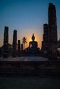 Silhouette of big buddha statue inside ruin temple at Sukhothai Royalty Free Stock Photo