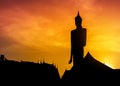 Silhouette big buddha statue standing in thai temple on sunset Royalty Free Stock Photo