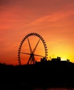 Silhouette of Big Ferris Wheel agaisnt the Sunset