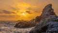 Silhouette of birds flying over the rocky cliffs of Big Sur in California during the sunset Royalty Free Stock Photo