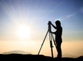 Silhouette black man survey and civil engineer stand on ground w Royalty Free Stock Photo