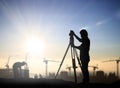 Silhouette black man survey and civil engineer stand on ground w