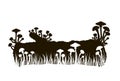 Silhouette of black and white mushrooms on a log in the grass