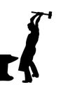 Silhouette of blacksmith with hammer in hand Royalty Free Stock Photo