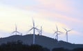 Wind turbines running at sunset in La Puebla de GuzmÃÂ¡n, Huelva, Andalusia, Spain. Royalty Free Stock Photo