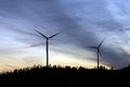 Wind turbines running at sunset in La Puebla de GuzmÃÂ¡n, Huelva, Andalusia, Spain. Royalty Free Stock Photo