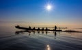 Silhouette of boat at sunset Inle Lake Burma Myanmar