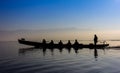 Silhouette of boat at sunset Inle Lake Burma Myanmar