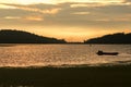 Silhouette of a boat in the water