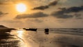 Silhouette Boats anchored with moody sky .