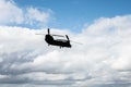 Silhouette Of A Boeing V-22 Osprey Aircraft On A Blue Cloudy Sky