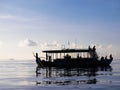 silhouette of bote in ocean Royalty Free Stock Photo