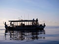 Silhouette of bote in ocean Royalty Free Stock Photo