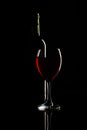 Silhouette of bottle and glass of wine over black Royalty Free Stock Photo