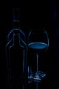 Silhouette of bottles with glass of wine Royalty Free Stock Photo