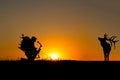 Silhouette of a bow hunter