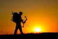 Silhouette of a bow hunter