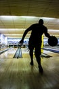 Silhouette of a bowling player Royalty Free Stock Photo