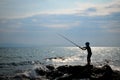 Silhouette of boy fishing Royalty Free Stock Photo