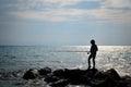 Silhouette of boy fishing Royalty Free Stock Photo