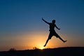 Silhouette of a boy jumping Royalty Free Stock Photo