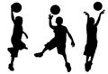 Silhouette of boy playing basketball