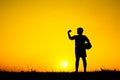 Silhouette of boy playing football during sky sunset Royalty Free Stock Photo