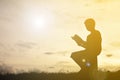 Silhouette a boy reading book