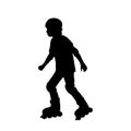 Silhouette boy skating on the rollerblades Royalty Free Stock Photo