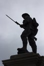 Silhouette of a British Tommy with drawn bayonet on a war memorial in Portstewart in Northern Ireland