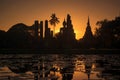 Silhouette at of Buddha and pagoda on sunset time at Sukhothai History park,Thailand. Thailand tourism concept, Asia traveling