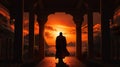 silhouette of buddhist monk walking by temple on mountain at sunset, asian spirituality concept Royalty Free Stock Photo