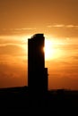 silhouette building in the golden light at sunset