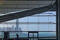 Silhouette of building sturction, man who washing interior glass wall