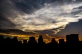 Silhouette of Building at sunset And silver and gold sky, The ar Royalty Free Stock Photo