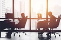 Silhouette business man in office working at desk Royalty Free Stock Photo