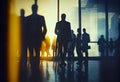 Silhouette business people walking on the background of the large windows Royalty Free Stock Photo