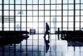 Silhouette Of A Businessman In Airport Terminal
