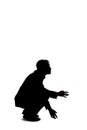 Silhouette of a Businessman or Detective Looking for Something