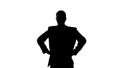 Silhouette of businessman holding hands on his hip, seriousness of intentions Royalty Free Stock Photo