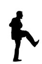 Silhouette of a Businessman Kicking Something