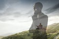 Silhouette of businessman with landscapes on background, double exposure. Royalty Free Stock Photo