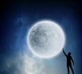 Reaching the moon. Mixed media Royalty Free Stock Photo