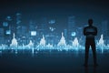 Silhouette of a businessperson analyzing futuristic digital cityscape and data visualization Royalty Free Stock Photo