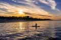 Silhouette of a canoeist in sunset Royalty Free Stock Photo