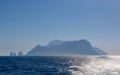 Silhouette of Capri island at dusk from a distance