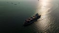 silhouette cargo container ship sailing in sea to import export goods and distributing products to dealer and consumers worldwide