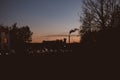 Silhouette of cars stacked on a busy street at sunset