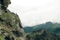 Silhouette of a champion on mountain peak. Active life concept Royalty Free Stock Photo